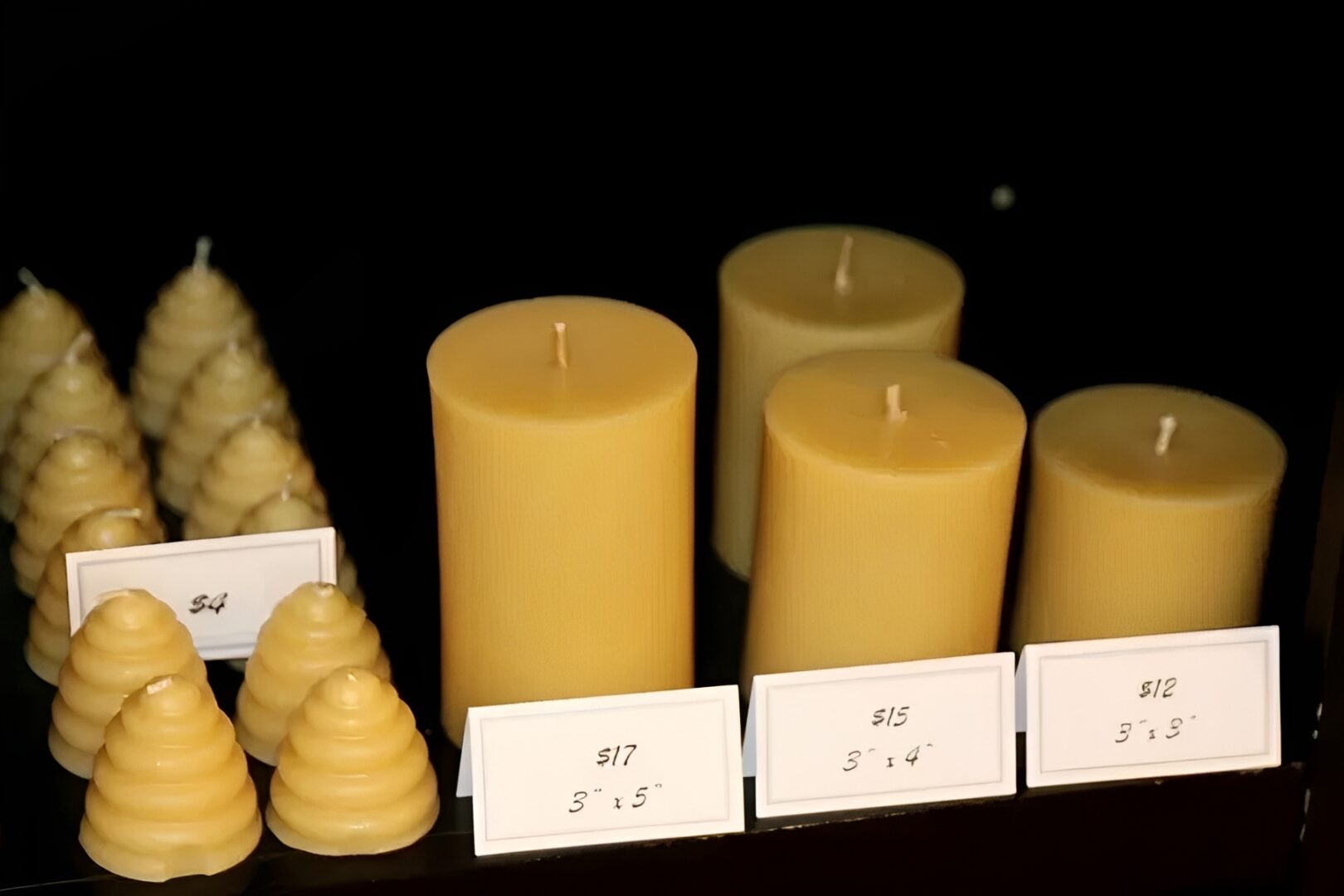 Beeswax candles on display shelf