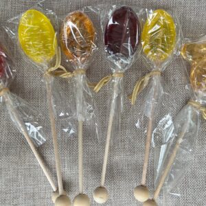 Colorful lollipops wrapped in plastic