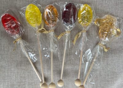 Colorful lollipops wrapped in plastic.