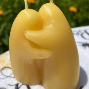 Hugging wax figures candle