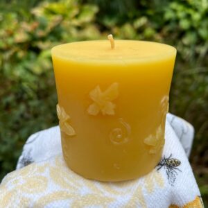 Beeswax Bee Candle on patterned cloth