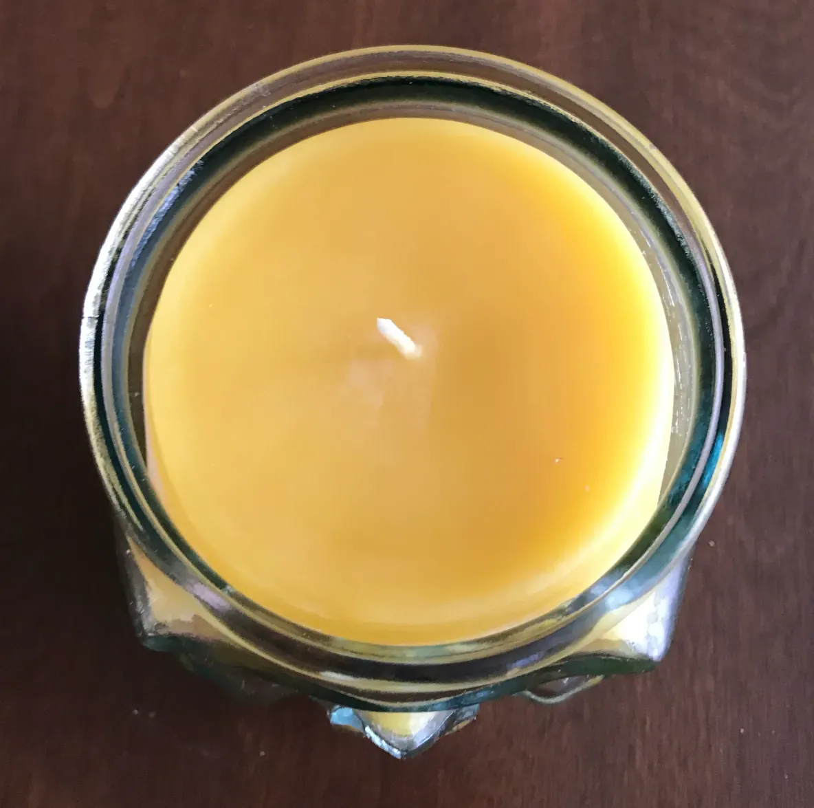 Top view of a lit candle