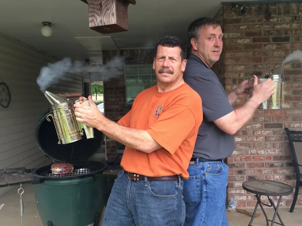Grilling on patio with meat smoker