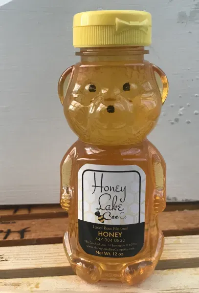Plastic honey bear with yellow cap