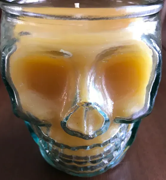 Glass skull candle holder
