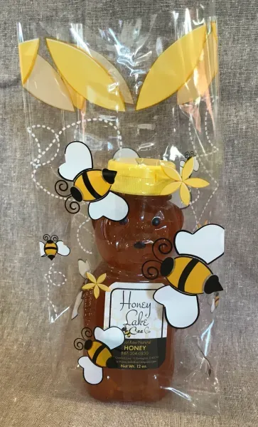 Decorative honey jar with bees