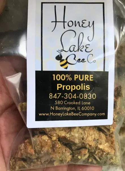 Pure propolis packaging held in hand