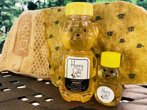 Honey Lake Co. labeled honey containers