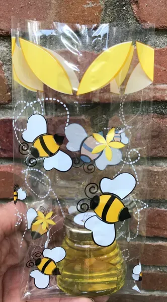 Bee-themed gift bag with yellow accents