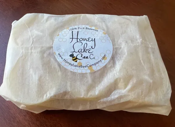 Beeswax package with Honey Lake label