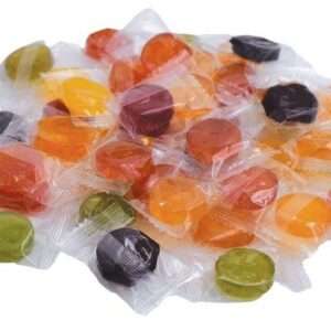 Wrapped colorful candies scattered on surface.