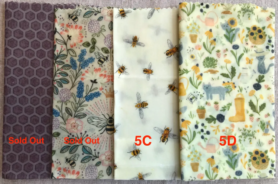 Assorted fabric patterns including bees and flora.