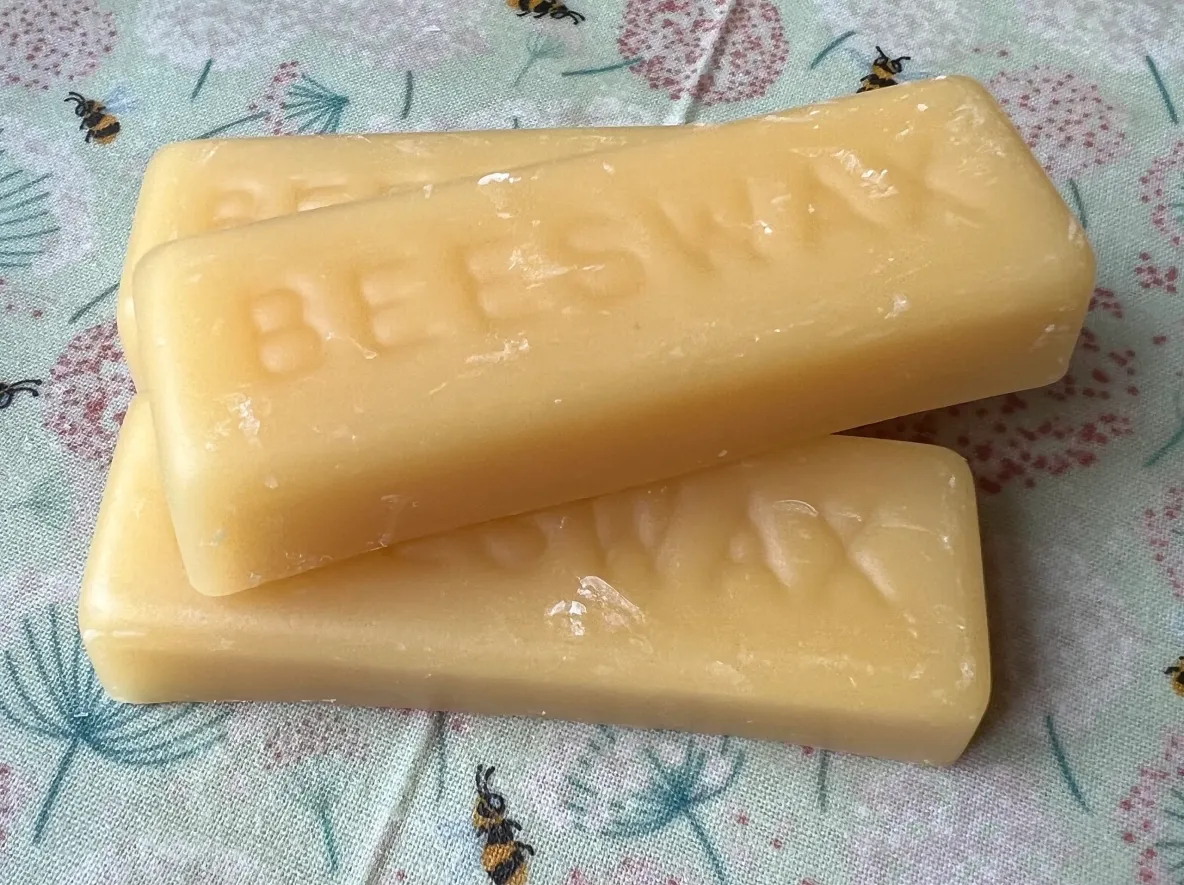 Beeswax bars on floral fabric