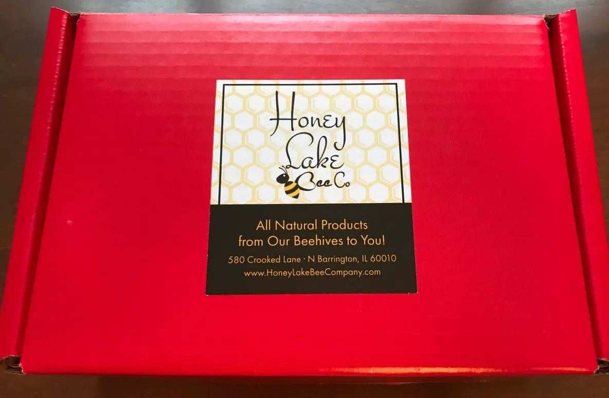 Red box with Honey Lake Bee Co label