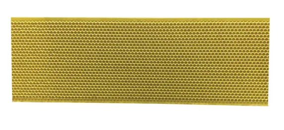 Yellow honeycomb texture close-up